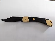 1988 Puma 230366 Gold and Black Knife with ABS Checkered Handles 