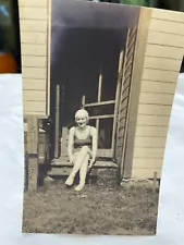 Vtg 1920s Woman wearing swim suit and hat sitting in doorway 3 x 4 in