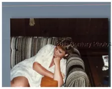 FOUND COLOR PHOTO R_4577 PRETTY WOMAN IN DRESS SITTING ON COUCH