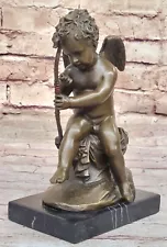 Bronze figure Cupid stringing his bow sign. Charles Louchet For Valentine Sale