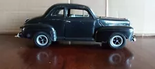 Vintage 1948 Ford Coupe "Rat Rod" built model car.