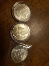 3 Silver Morgan Dollars ... Uncertified