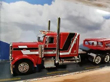 DCP 1:64 Peterbuilt 389 w/ red Miller Industries Car Hauler Trailer *NIB