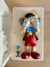 Authentic! KAWS Pinocchio & Jiminy Cricket Vinyl Figure (Medicom x Disney)