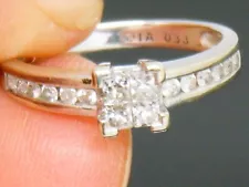 9ct Gold 0.33ct princess and round cut diamond Ring size I