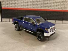 2022 GMC Sierra 2500 HD Lifted 4x4 Truck 1/64 Diecast Custom Duramax Greenlight