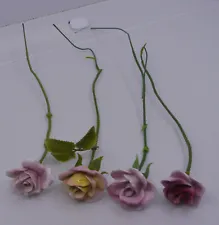 4 VINTAGE ENGLISH? BONE CHINA ROSES ON PLASTIC COATED WIRE STEMS