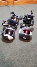 Lot 4 Baitcaster Fishing Reels Daiwa Abu Garcia Quantum Used