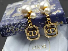 AUTHENTIC- CHRISTIAN DIOR - TRIBALES ERRINGS - With Dior Box And Pouch