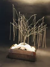 Weeping willow tree on a white piece of clay base with silver wire  