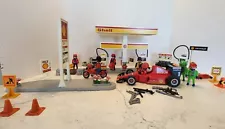 Playmobil Vintage Shell Gas Station 3437 with formula 1 racer, motorcycle & men