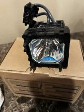 TV Replacement Lamp in Housing for Rear Projection Mitsubishi Televisions.