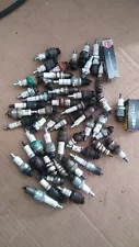 50 used small engine/automotive Spark Plugs to clean and use or go fishing