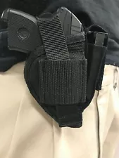 RAVEN 25 TITAN, EXCAM TARGA HOLSTER WITH EXTRA MAGAZINE HOLDER ATTACHED