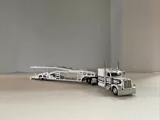 DCP 1/64 scale Peterbilt 389 with Miller Industries Car Hauler