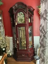 Anitque Curio Grandfather Clock for sale, cherry wood, 7 feet tall.