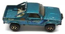 2012 Hot Wheels Subaru Brat Green Blue Surf Camp Mattel Diecast Collectible