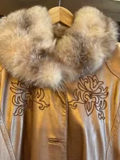 Beautiful adorned Dero by Rocco D'Amelio for sale. full-length leather fur coat.