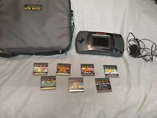 Atari Lynx lot console with 7 Games, and carrying case see description