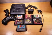 Sega MK-1631 Genesis 1 Console System, 1 controllers, 7 games.