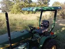 John Deere 670 with loader, mower, box blade attachments             