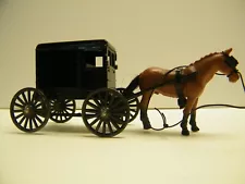 LOT 1 E AMISH HORSE AND BLACK AMISH BUGGY