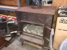 Vintage Schrader wood burning stove, 32"x32"x24". 6" flue