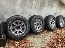 18 inch 275/70/R18 with centers and lug nuts.tires and wheels for f250/f350 Ford