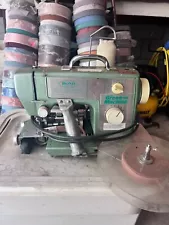 dual puller carpet binding machine