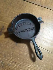 VINTAGE CARDWELL'S FURNITURE CAST IRON ASHTRAY IN GOOD USED CONDITION...