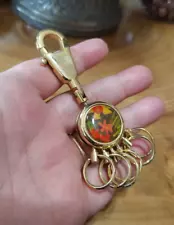 Gold toned metal with floral pattern belt clip keychain key ring