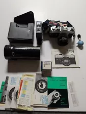 Canon FTb-QL 35mm SLR Camera with an Extra Lens, a Flash, Instructions and MORE!