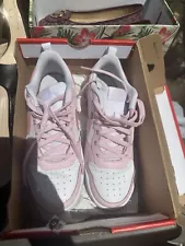 Nike women’spink/white sneakers