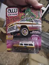 Auto world 1/64 Sema 1965 chevrolet suburban Rat fink gold NIB