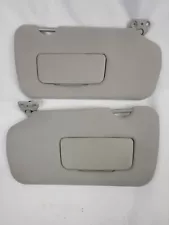 Nissan Altima 2005-2006 Sun Visor Pair Driver Passenger Gray (For: 2005 Nissan Altima)