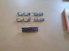 Vintage 1960s Chevy Corvair 140 Corsa Emblems