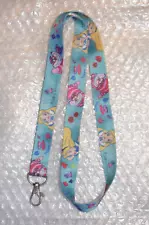 Disney Pin Lanyard Alice in Wonderland Cheshire cat teal background