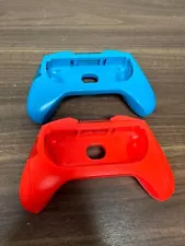 Pair Of Red And Blue Grips For Nintendo Switch Joy Cons Very Good 2E