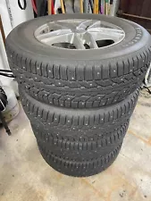 255/65R17 Studded Firestone Winterforce Snow Tires mounted on Rims for Mazda CX9