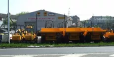 Photo 6x4 Stewart Plant Sales Glasgow Shiny new yellow dump trucks for sa c2007