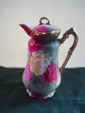 Antique chocolate pot with beautiful roses pattern