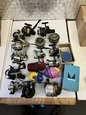 pre-owned fishing reel lot used. All Different Kinds And All Different Sizes.