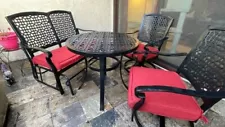 4 pc cast aluminum patio set w/cushions.