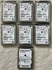 LOT OF 7 - HGST and Samsung 1TB SATA Laptop Hard Drives - 2.5"