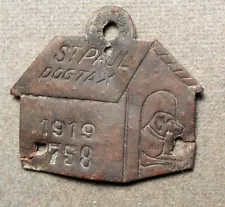 Dog License Tax Tag: St. Paul Dog Tax, 1919, #758. Brass, dog house shape, two s