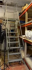 Used 9 step Rolling Warehouse Ladder