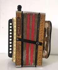 HOHNER ACCORDION - Hohner one row, four stop key of C