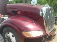 2014 Peterbilt 386 hood Maroon (see pictures for work to be done)