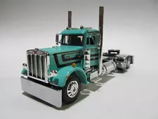 DCP / FIRST GEAR 1/64 SCALE 359 PETERBILT DAY CAB, TEAL WITH BLACK STRIPE