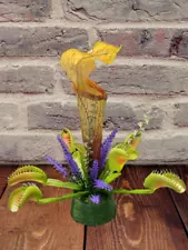 Artificial pitcher plant table decoration with a carnivorous plants fly trap